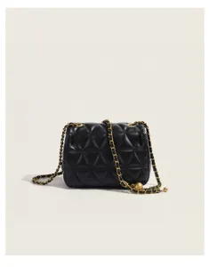 Black quilted leather crossbody chain bag with elegant golden ball accent for daily fashion.