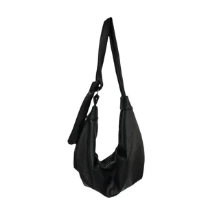 Black PU leather hobo dumpling bag for women, stylish retro casual soft shoulder crossbody bag.