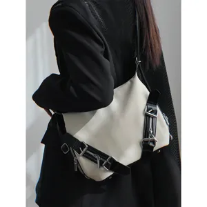 Stylish gothic punk motorcycle style shoulder tote bag with double buckle and zipper design.