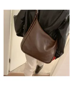 Vintage slouchy brown shoulder bag, trendy large capacity tote bag for women daily wear.