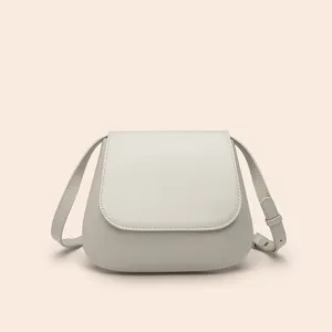 Light grey PU leather shoulder bag, minimalist saddle bag with flap and adjustable strap.