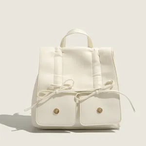 Zaino donna in pelle PU bianco con tasche frontali con fiocco e manico vista principale