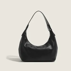 Black PU leather hobo shoulder bag, trendy casual dumpling handbag for women daily wear.