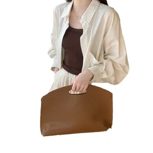 Minimalist brown leather laptop sleeve briefcase and commuter bag for women elegant office use
