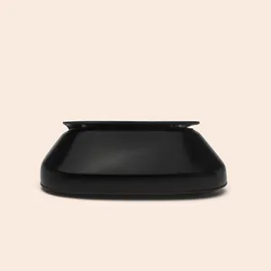 Detailed view of minimalist black PU leather chestnut saddle bag, chic retro crossbody purse.