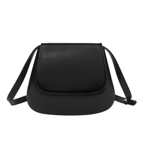 Black PU leather saddle bag for women, retro crossbody shoulder bag with premium aesthetic.