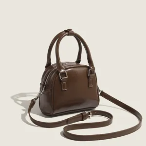 Korean style retro brown dome handbag, commuter casual crossbody bag for women fashion.