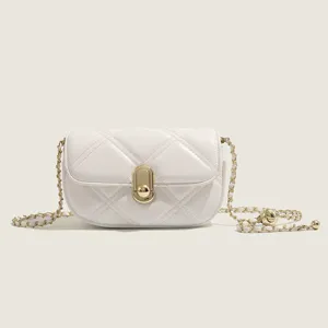 Elegant white quilted chain crossbody bag for women, stylish mini shoulder bag with gold hardware.