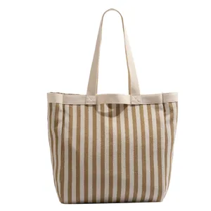 Casual striped canvas tote bag for women, large capacity shoulder bag for daily commuting.
