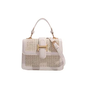 Woven small square bag for women, summer straw crossbody bag with chic gold hardware and handle.