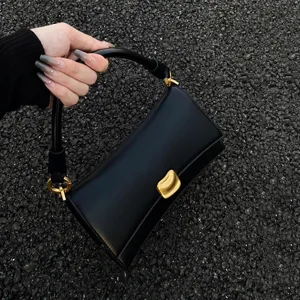 Black leather baguette underarm bag women urban fashion trendy handheld shoulder purse main view