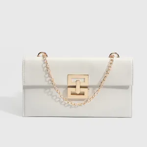 Stylish white women crossbody bag with gold chain strap and chic geometric metal lock.