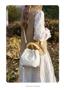 Japanese literary quilted mirrorless camera bag, chic white canvas shoulder crossbody bag.