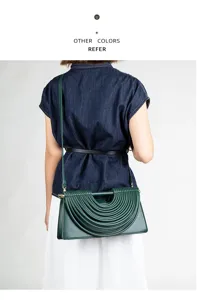 Dark green pleated shoulder bag for women, retro chic design crossbody bag with metal accents.