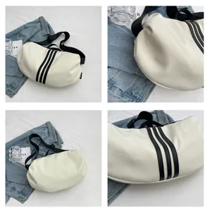 Women casual large capacity shoulder crossbody bag white crescent bag with black stripes.