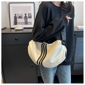 Stylish large capacity white hobo shoulder bag with black stripes for casual daily travel.