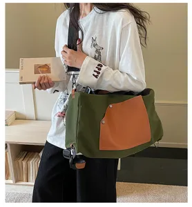 Borsa a tracolla in tela casual per uomo e donna, elegante borsa da viaggio multifunzione.