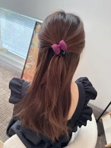 Accessorio per capelli con fiocco in cotone imbottito stile coreano dettaglio coda di cavallo.