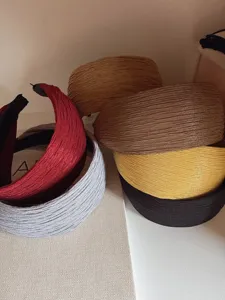 Retro wide fabric headband featuring pleated design, elegant and simple hair accessory for daily use.