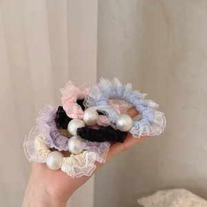 Elegant mesh lace ruffle hair scrunchies with large pearl decoration for women and girls.