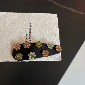 Satin rhinestone flower hair clip, retro fabric BB clip for chic styling and bangs.