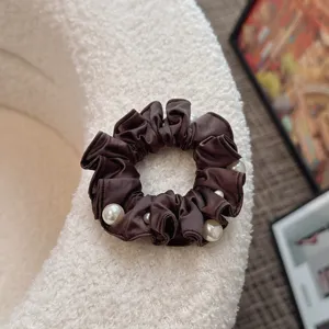 Brown satin hair scrunchie with elegant faux pearls, Korean style minimalist for ponytail.