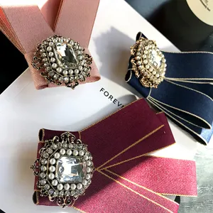 Vintage rhinestone pearl fabric bow brooch pin, elegant court style collar accessory for women.