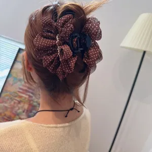French vintage polka dot mesh hair claw clip detailed view, brown aesthetic hair accessory for women.