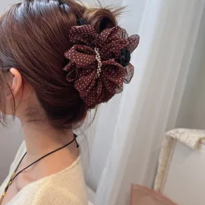 French vintage polka dot mesh hair claw clip for elegant women hair styling and buns.