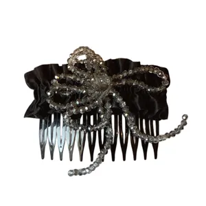 Black crystal beaded insert hair comb, elegant rhinestone bow hair accessory for side styling.