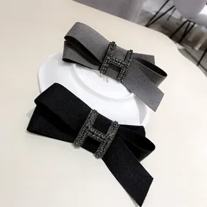 Fabric bow hair clip with rhinestone H buckle, elegant hairpin for women daily wear.