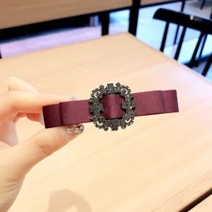 Burgundy satin hair clip with sparkling rhinestone buckle, elegant ponytail barrette.