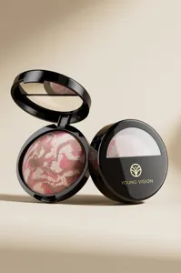 Detailed view of baked marble powder blush in glossy black compact case with built-in mirror.