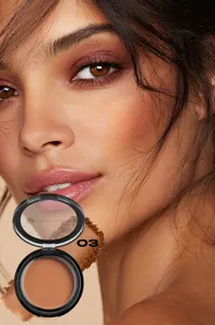 Matte bronzer powder compact with smooth texture and natural contour shade for face makeup.