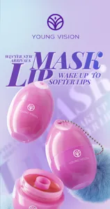 Detail view of pink egg-shaped lip mask with fluffy pom-pom and chain, smooth texture.