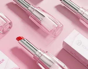 YOUNG VISION clear pink moisturizing lipstick detail view, glossy hydrating lip balm makeup.