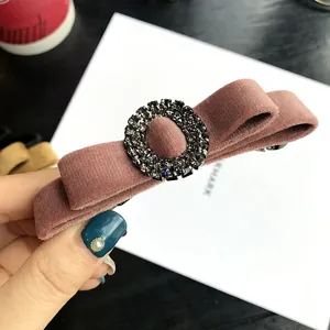 Velvet bow hair clip with sparkling rhinestones, elegant Korean style hair accessory for women.