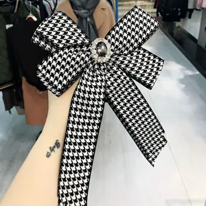 Korean style black and white houndstooth bow brooch with rhinestone center for women fashion