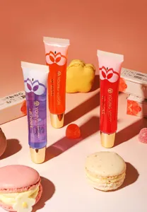 YOUNG VISION hydrating lip gloss detail showcasing glossy texture and vibrant color formulas.