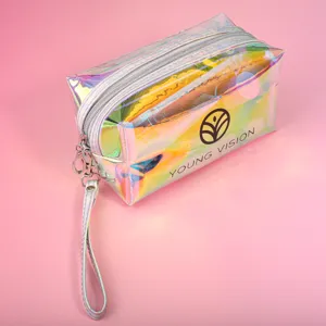Detail view of YOUNG VISION holographic transparent makeup bag with wrist strap and zipper.