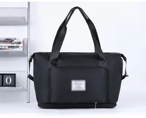 Large capacity black travel duffel bag with dry wet separation and sturdy carry handles for gym yoga.
