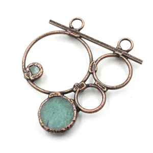 Vintage copper wire wrapped raw green crystal geometric pendant necklace jewelry accessory.