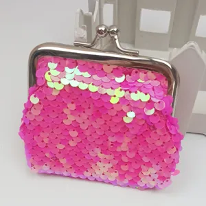 Mini pink sequin coin purse with kiss-lock metal frame, cute shimmering pouch for daily use.