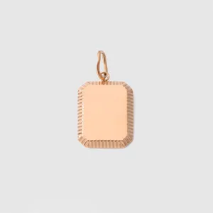 Gold titanium steel blank rectangle pendant tag detail close-up showing fluted border design