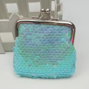 Iridescent sequin coin purse with metal kiss lock, compact jewelry storage key bag detail view.