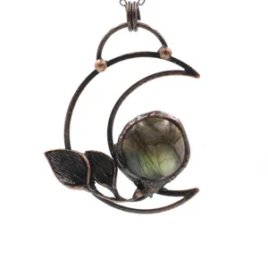 Retro copper crescent moon crystal pendant necklace, vintage leaf design gemstone jewelry accessory.
