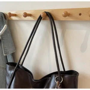 Vintage oil wax leather tote bag, large capacity shoulder handbag for daily commute.