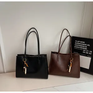 Large capacity commute tote bag, vintage PU leather shoulder handbag with stylish bead charms.