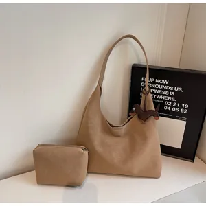 Vintage minimalistische slouchy schoudertas set met cosmeticatasje voor dagelijks gebruik.