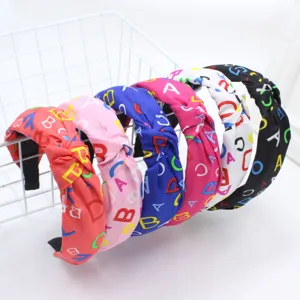 Bandeau à cheveux en tissu imprimé de lettres colorées pour femmes, accessoire.